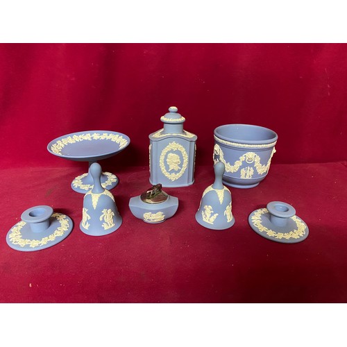 34 - Selection of Wedgewood jasperware including plant pot, plate, candlestick holders, bells, cigarette ... 