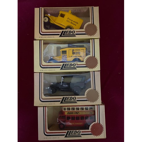 138 - Selection of 12 boxed Lledo promotional models of buses and vans