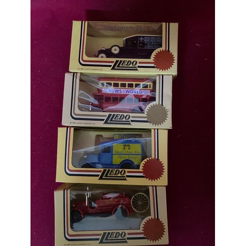 138 - Selection of 12 boxed Lledo promotional models of buses and vans