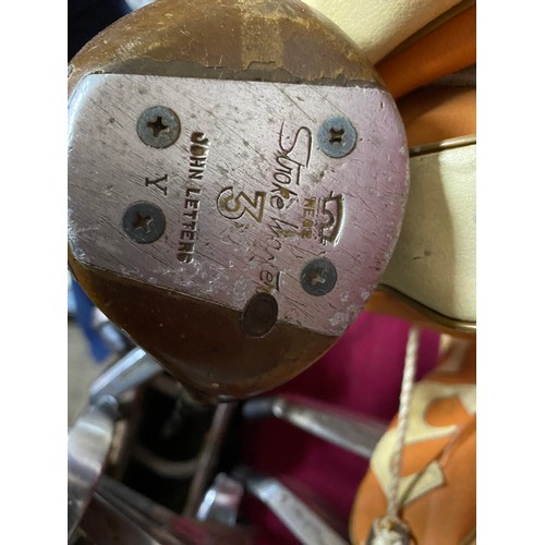 207 - Set of ladies John Letters stroke master golf clubs consisting of 4 woods and 9 irons, a putter and ... 