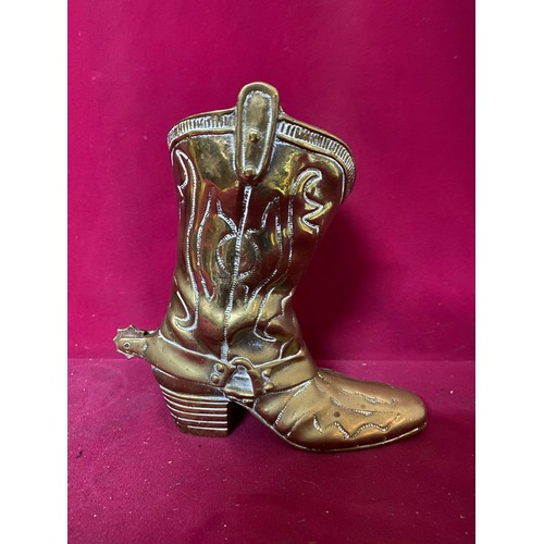 217 - Brass cowboy boot with spur measuring 22 cms tall