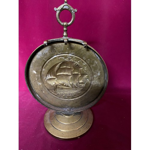 218 - Brass gong depicting galleon in full sail measuring 37 cms tall