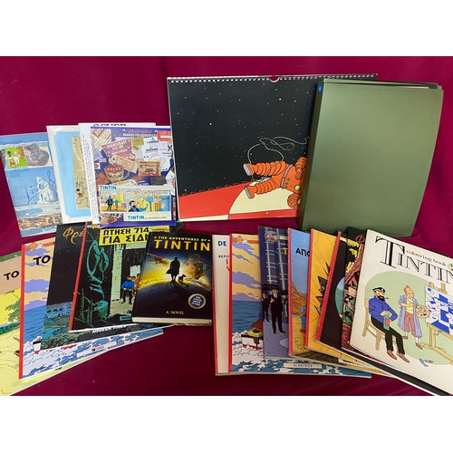 91 - Box of TinTin books and memorabilia