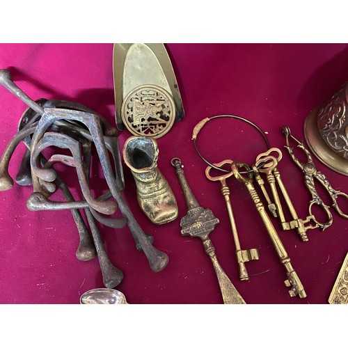 104 - Large box of brassware including bell, keys and coathooks