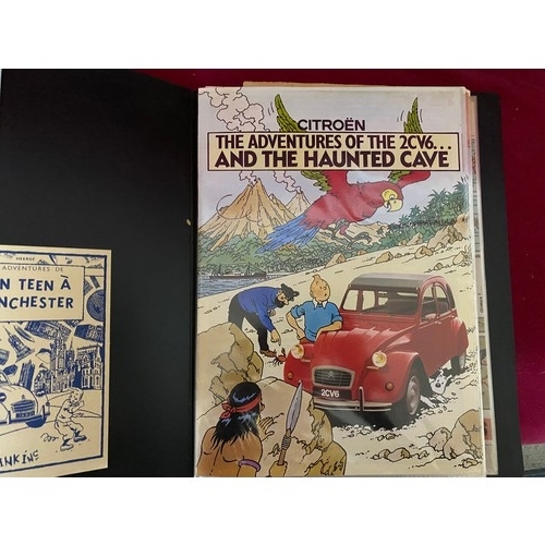 91 - Box of TinTin books and memorabilia