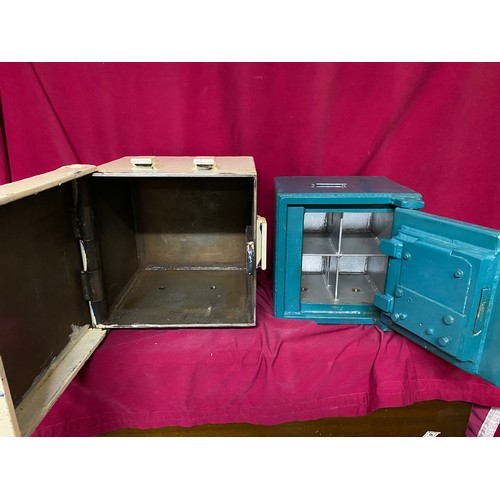 56 - Lockable safe with lockable outer cover. Complete with key and measuring 30cms square