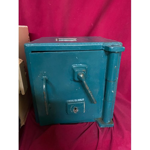 56 - Lockable safe with lockable outer cover. Complete with key and measuring 30cms square