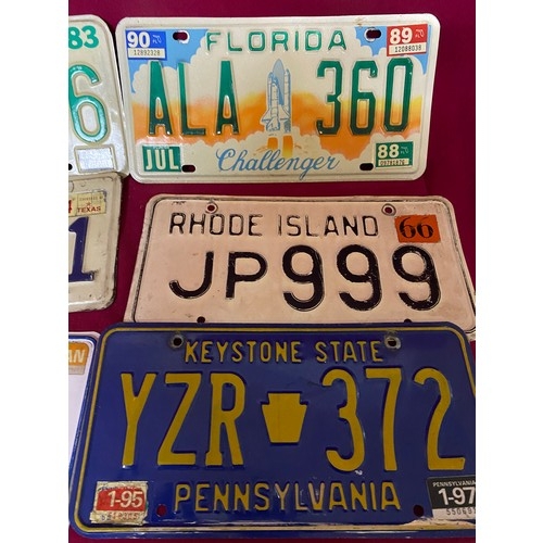 201 - Selection of 15 vintage metal American license plates including a Florida Challenger and a Georgia 1... 