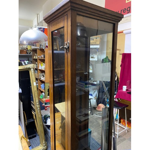 57 - Tall glass display cabinet complete with shelves, 170x28x23cms