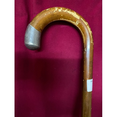 183 - Silver hooded walking stick