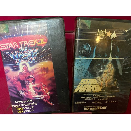 278 - Original rental Star Wars video and 3 figures, also Star Trek II video.