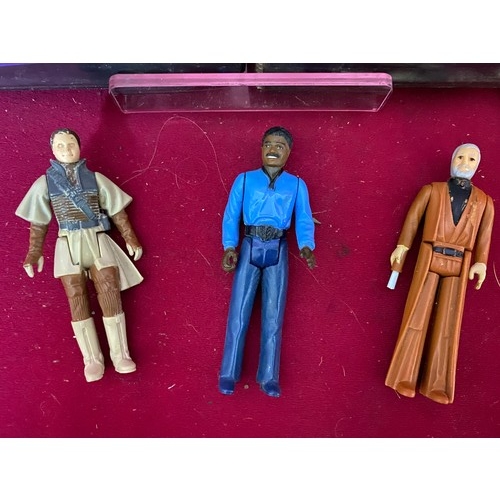 278 - Original rental Star Wars video and 3 figures, also Star Trek II video.