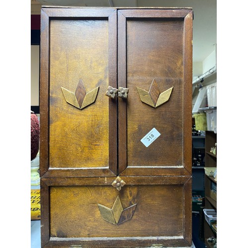 318 - Vintage wall hanging wood cupboard with 2 doors and drop down door .  Wood decoration to front 40x64... 