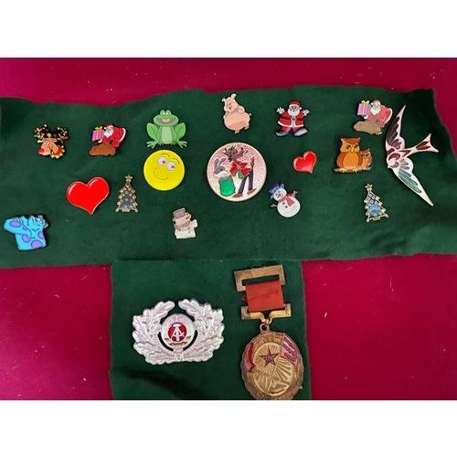 343 - Selection of badges and a Russian medal