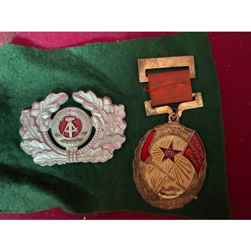 343 - Selection of badges and a Russian medal