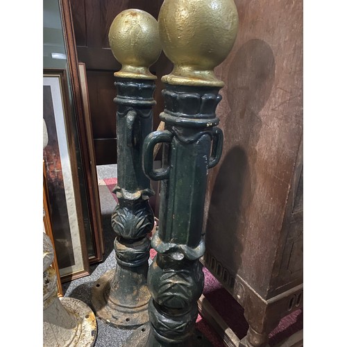 906 - Pair of Green and gold cast iron decorative parking bollards. 80cms