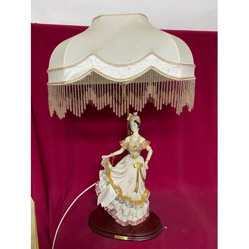 921 - Lamp by Vittorio Sabadin. Lady figure with large shade and bead tassle trim. 85cms tall