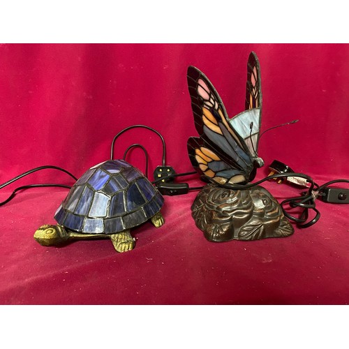 923 - Butterfly and Tortoise lamps with tiffany style glass. Some repair needed to both.