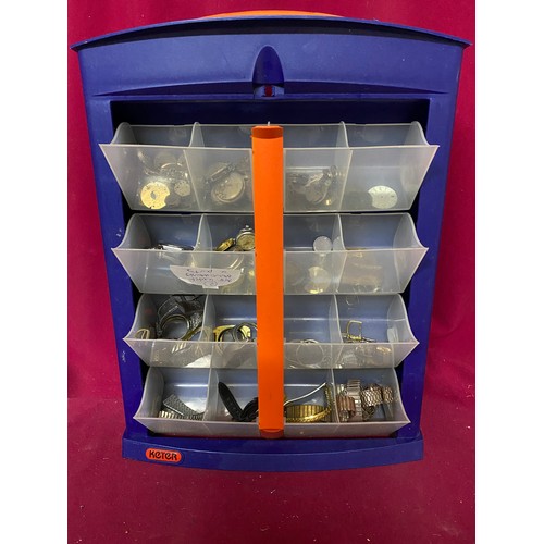 937 - Selection of watch parts and straps in display case. 32x46cms.