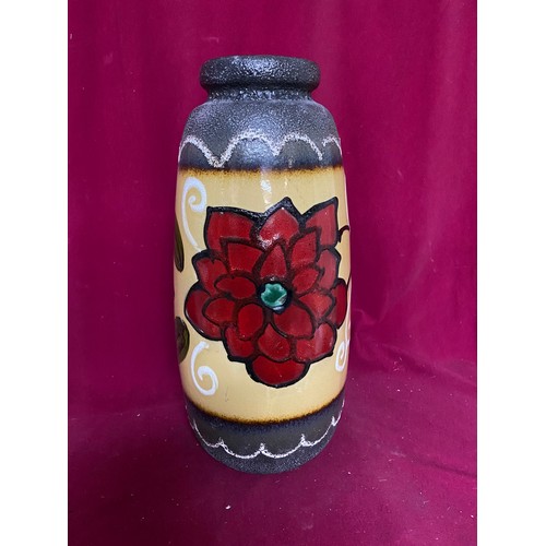 939 - Large decorative ceramic vase with flower pattern. 48cms