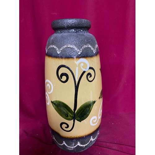 939 - Large decorative ceramic vase with flower pattern. 48cms