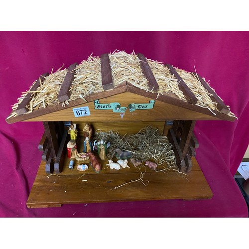 671 - Christmas nativity scene complete with baby Jesus and animals