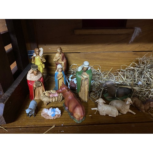 671 - Christmas nativity scene complete with baby Jesus and animals