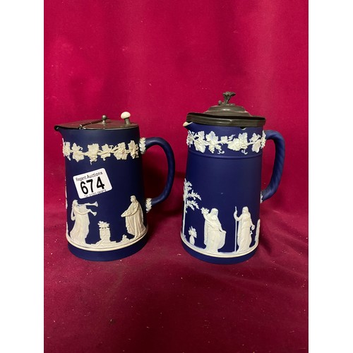 674 - 2 x Cobalt blue jasperware tankards