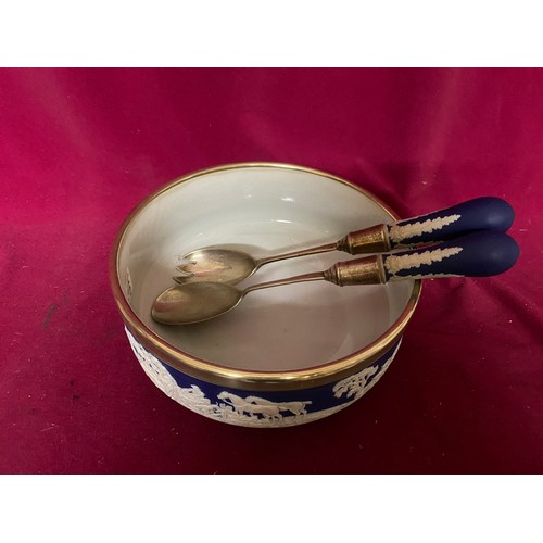 676 - Cobalt blue jasperware bowl measuring 23 cms diameter and salad servers