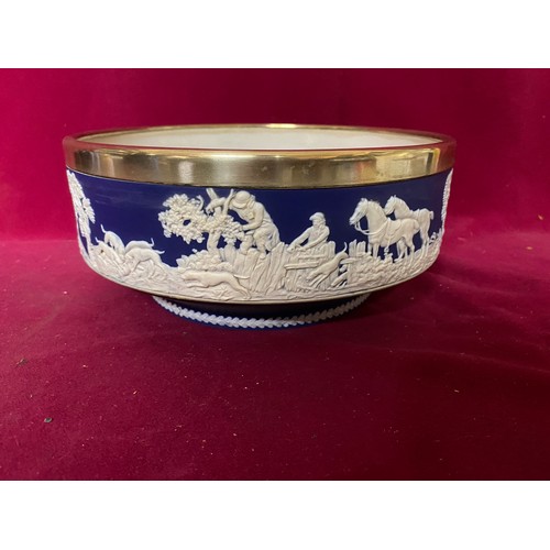 676 - Cobalt blue jasperware bowl measuring 23 cms diameter and salad servers