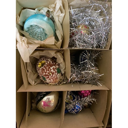 679 - Selection of vintage Christmas ornaments and box of vintage crackers.