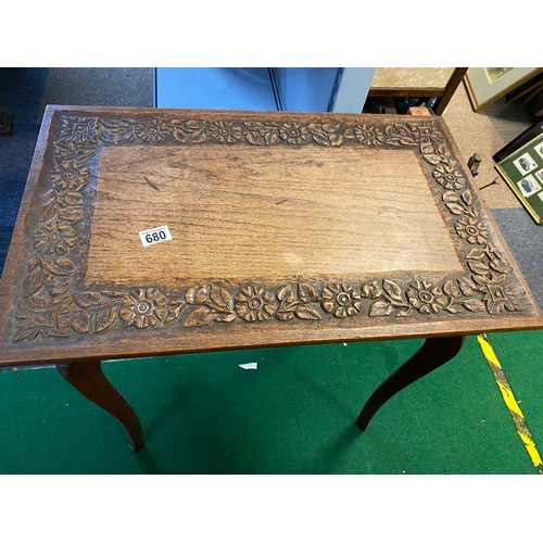 680 - Decorative carved occasional table measuring 70 x 43 x 70 cms tall