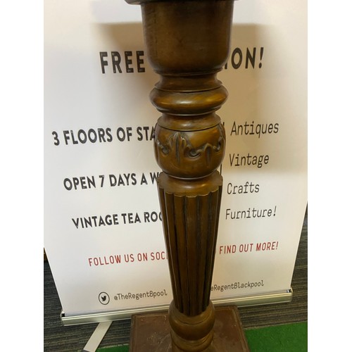 711 - Wooden pedestal plant stand measuring 100 cms tall