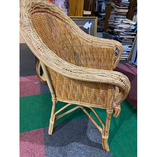 719 - Cane armchair and wicker table