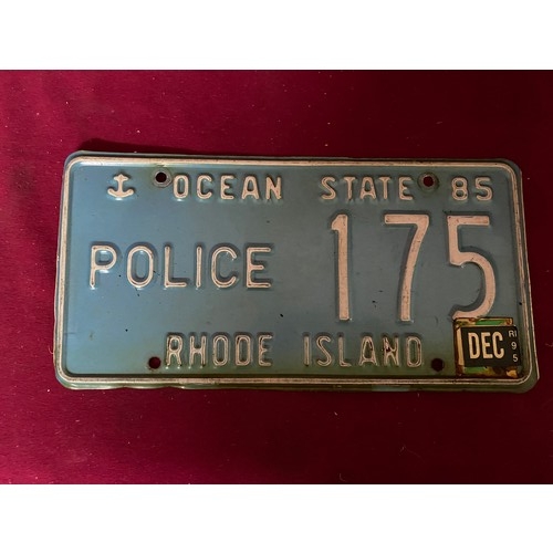 984 - 2 American reg plates, a Ocean State police plate and a American Paradise US virgin plate