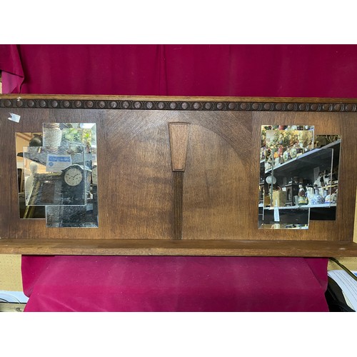 988 - Art deco oak overmantle mirror measuring 138 x 58cms