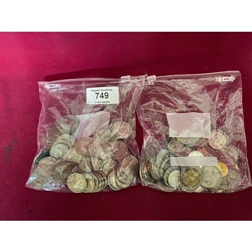 749 - 2 bags of old coins.