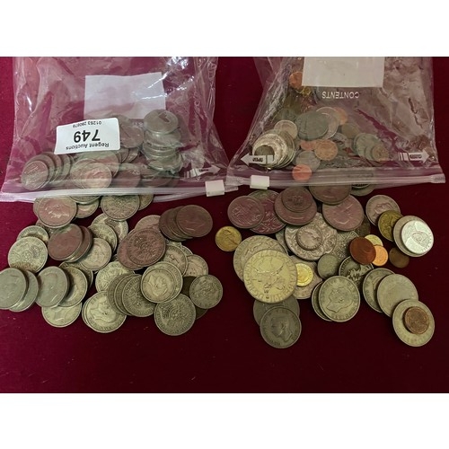 749 - 2 bags of old coins.