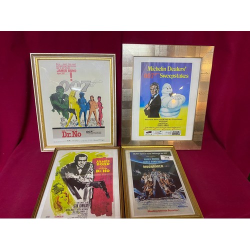 395 - Collection of 4 James Bond mini posters in frames.