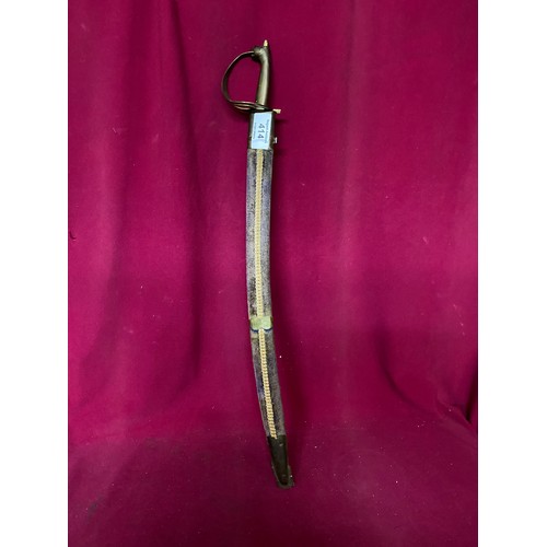 414 - Decorative sword in sheath.