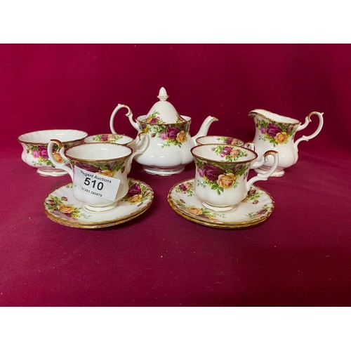 510 - Royal Albert 'country roses' 1 pint teapot with 4 cups and saucers, milk and sugar bowl