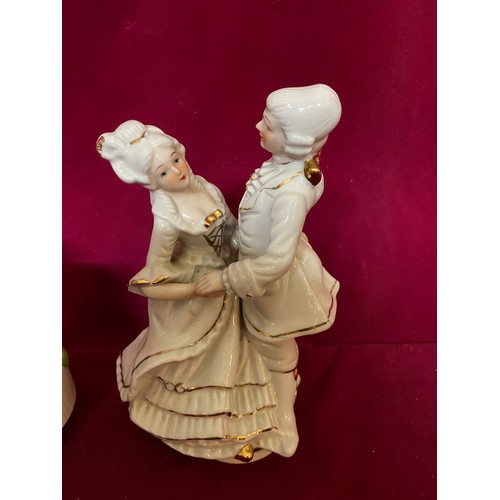 562 - 2 vintage porcelain musical figurines both working