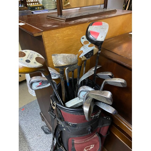 568 - Selection of golf clubs in bag from Penfold, Wilson and Dunlop