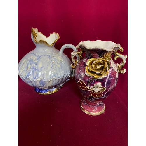 580 - Selection of glass vases and pottery jugs and bowl.