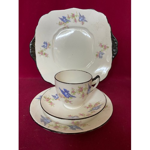 584 - Royal Albert Bluebird teaset comprising of 6 cups, saucers, side plates and a cake plate.