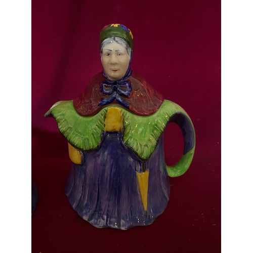 636 - Antique 'Grandma' teapot and creamer.