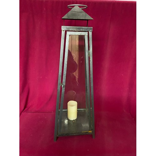 652 - Large metal and glass candle holder 74cms tall