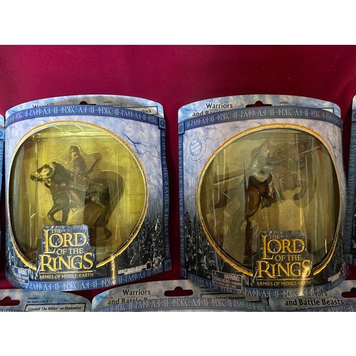 588 - 9 packs of figures from Play Along New Line Cinema, Lord of the Rings Armies of the Middle Earth, ma... 