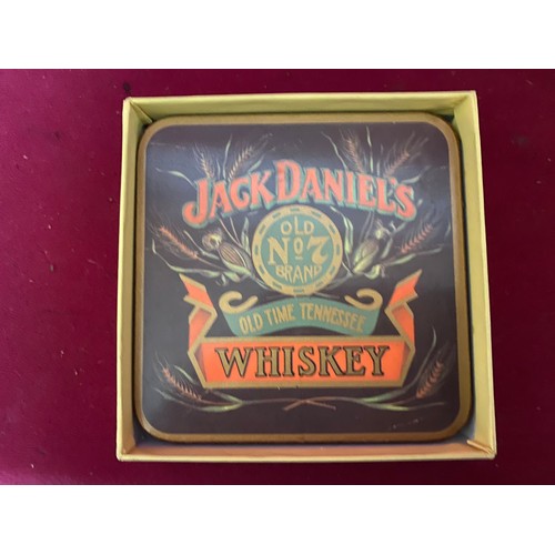 356 - 2 Jack Daniels promo glass tumblers and a set of 4 JD coasters. Also Southern Comport tumbler and Is... 