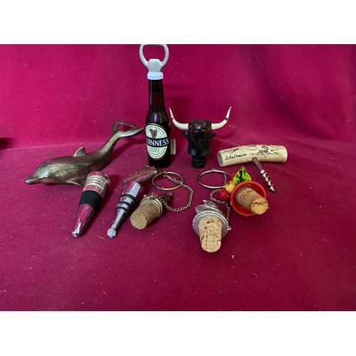 357 - Collection of vintage corkscrews, bottle stoppers and bottle openers.